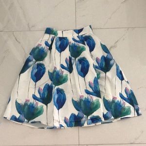 white midi skirt with blue and green flowers